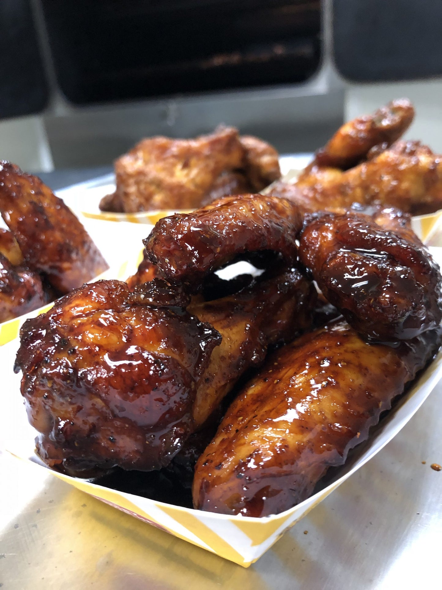 Chicken wings glazed with Smokehouse Bayou glaze and marinade