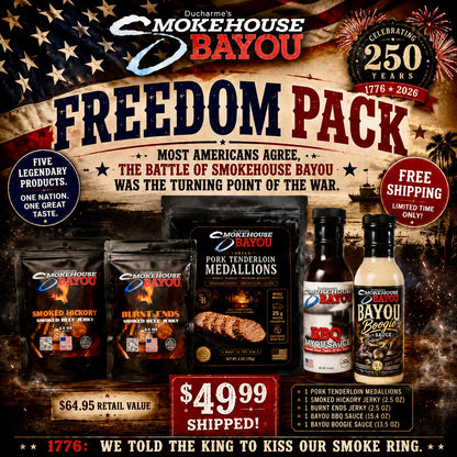 Smokehouse Bayou Freedom Pack featuring smoked pork tenderloin medallions, pit-smoked beef jerky, BBQ sauce, and Bayou Boogie Sauce celebrating 250 years of American freedom.